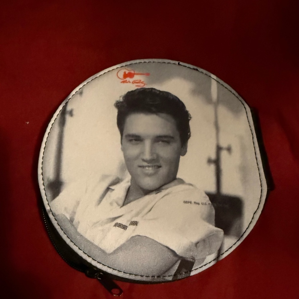 A collectible Elvis Presley zipper cd case